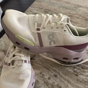 On Running Women's Sneakers in Cream, Lavender, and Light Green